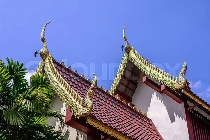Beautiful gable apex on the roof of buddhist temple, stock photo