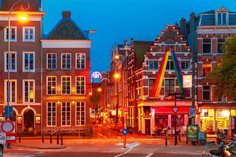 Night city view of Amsterdam street with typical dutch houses, Holland, Netherlands, stock photo