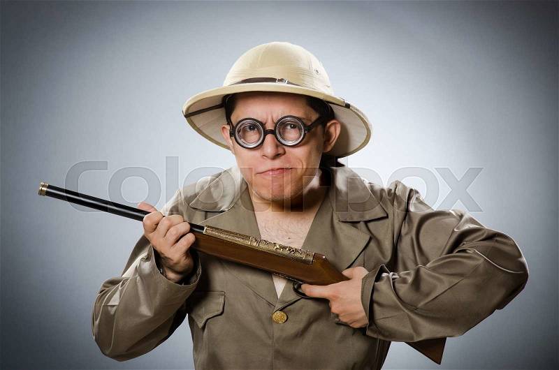 Funny hunter in hunting concept, stock photo
