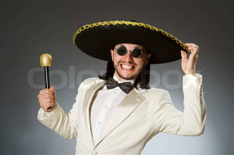Person wearing sombrero hat in funny concept, stock photo