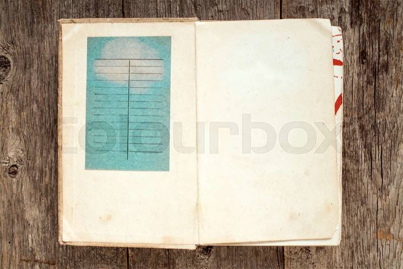 First two pages of a vintage library book with due date card. , stock photo