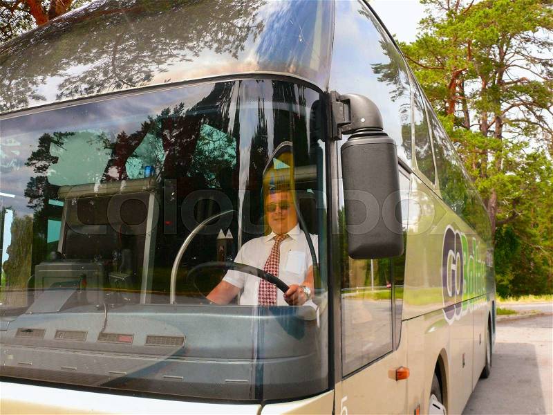 The young bus driver on the roads of Lithuania, stock photo