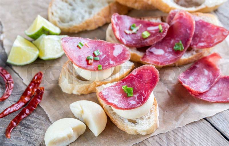 Ciabatta sandwiches with fuet and mini cheese, stock photo