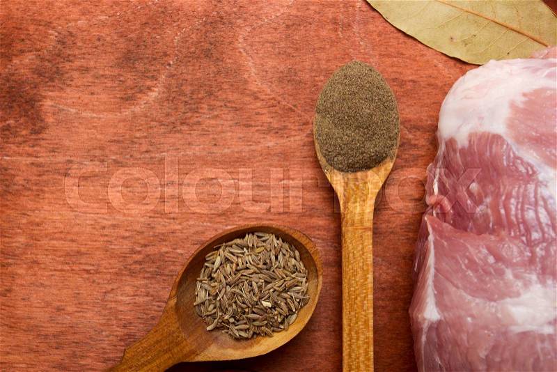 Set of spices for cooking meat on the kitchen table surface, stock photo