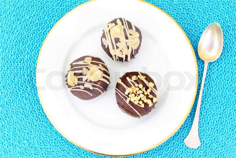 Sweetness: Chocolate Cake Potatoes on Plate. Studio Photo, stock photo