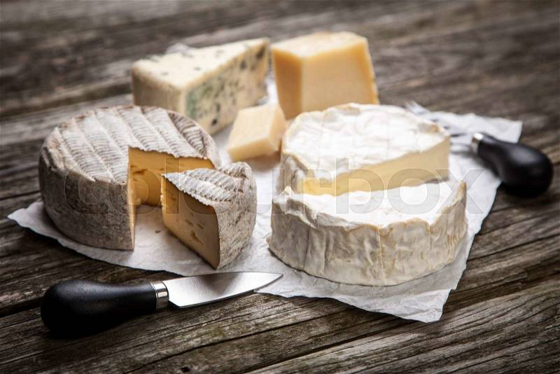 Soft french cheese of camembert and other types, stock photo
