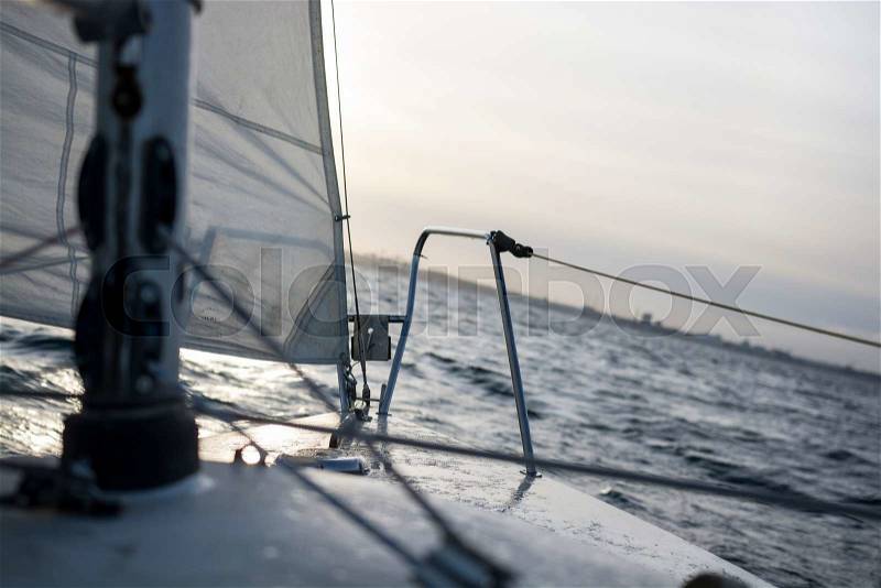 Sailing on a cold winters day. Here is the deck of a small sail boat. Authentic, stock photo