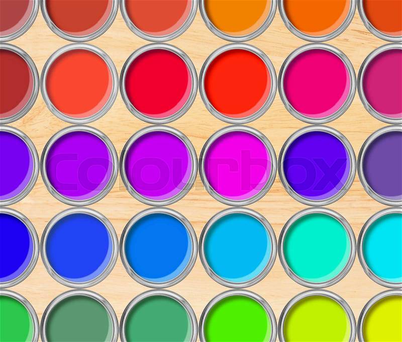 Paint cans color palette, cans opened top view on wooden table background, stock photo