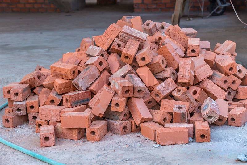 Group of red bricks Inside building with construction unfinished, stock photo