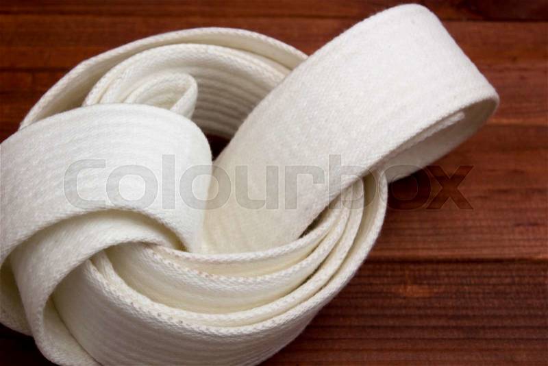 Belt - clothing accessory for karate lessons in martial arts, stock photo