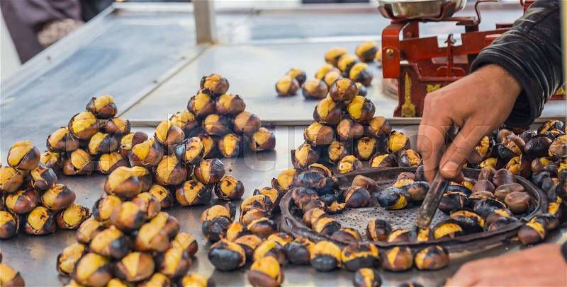 Delicious roasted chestnuts at Istanbul street, stock photo