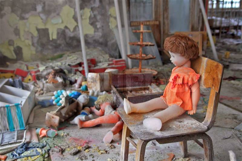 The doll in the kindergarten in the town of Pripyat, abandoned after disaster at the Chernobyl nuclear power plant in 1986, stock photo