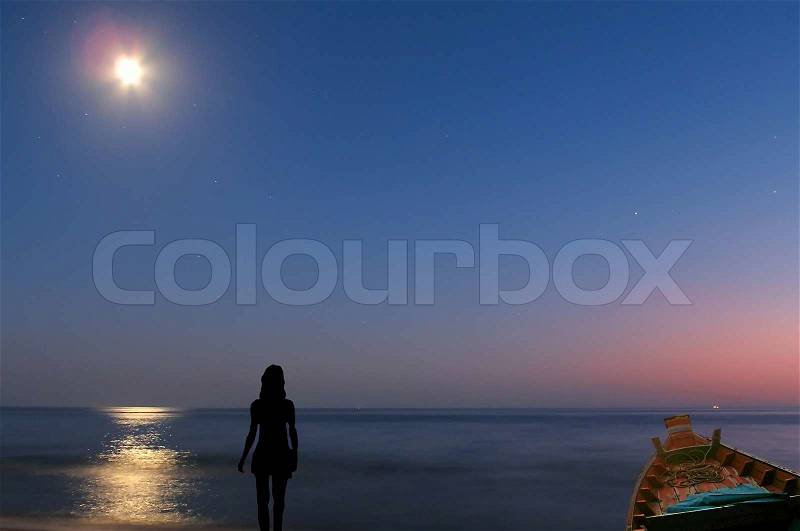 Moonlight in the dark night on the deep black sea, stock photo