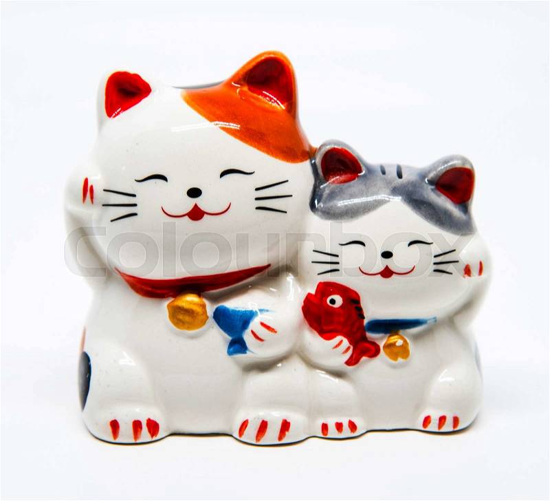 Ceramic Japanese welcoming Cats or lucky Cat ( Maneki Neko ), stock photo