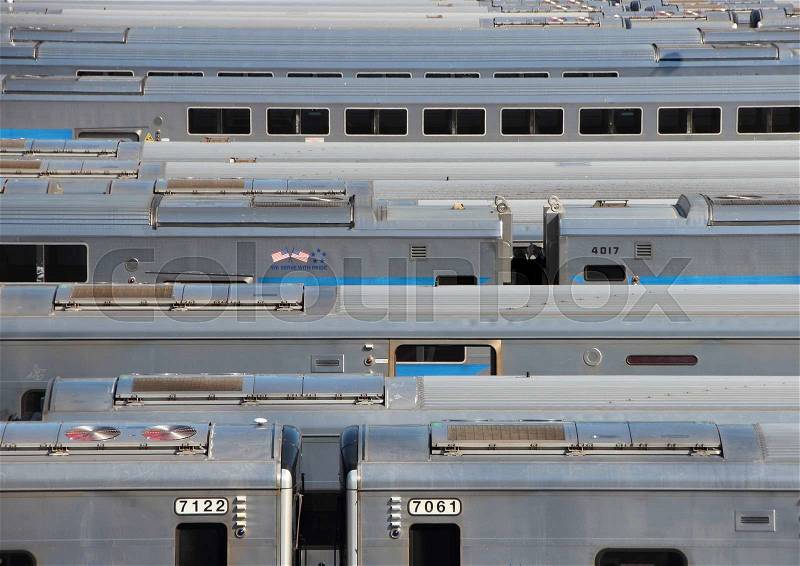 New York Metro Silver Trains Parking Range Area Background in Sunlight, stock photo