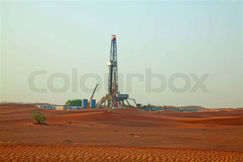 Sunset over oil field in the Red sand \
