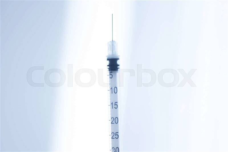 Phials of pharmaceutical insulin medication U-40 syringe in hospital clinic on table of doctor, stock photo