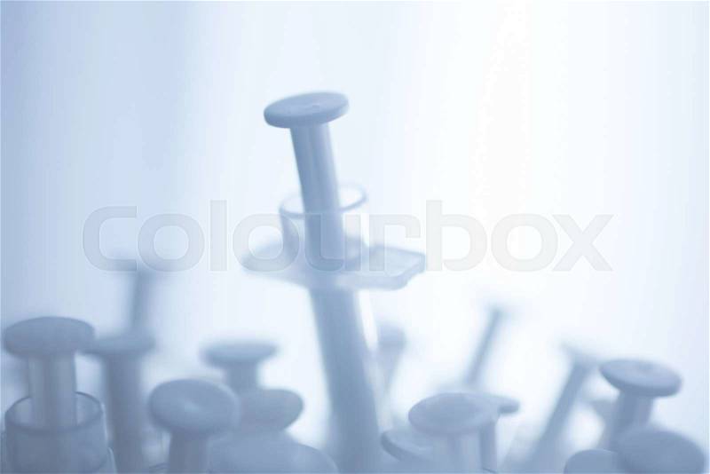 Phials of pharmaceutical insulin medication syringe in hospital clinic on table of doctor, stock photo
