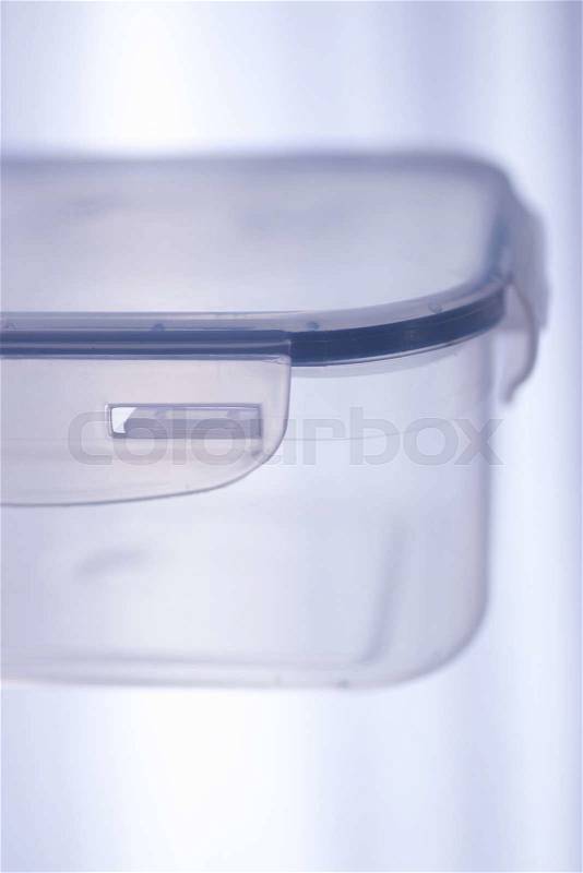 Kitchen food storage transparent plastic container, stock photo
