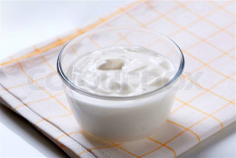 Bowl of smooth white cream, stock photo