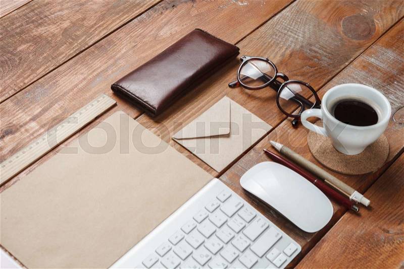 The responsive design mockup on wooden background, stock photo