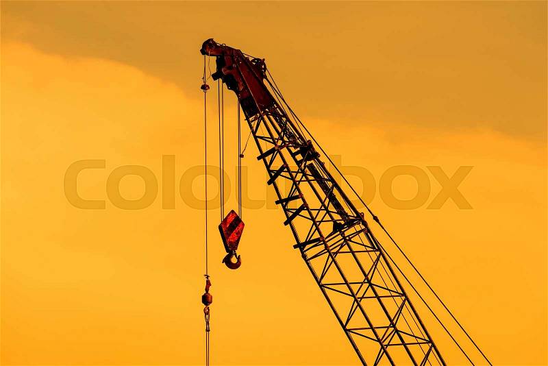 Close up of crane at construction site, stock photo