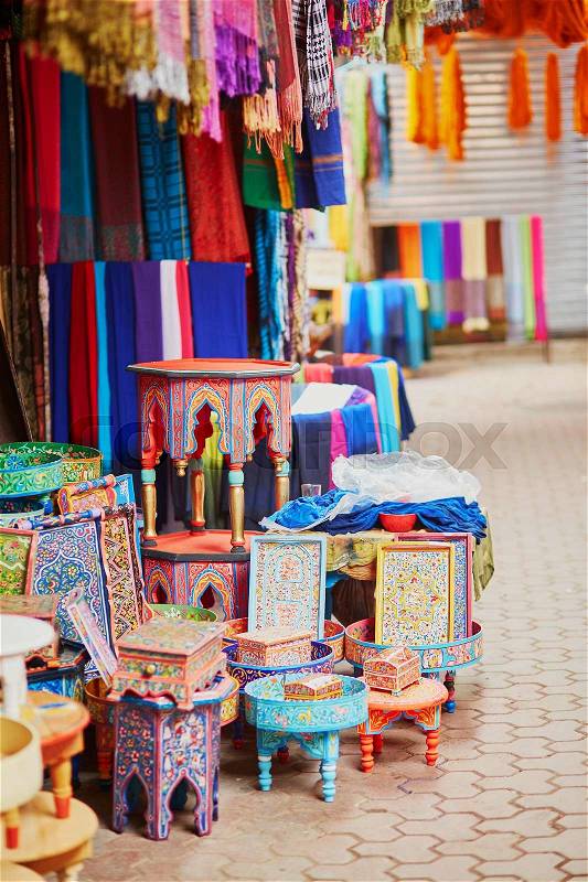 Selection of wooden furniture on a traditional Moroccan market (souk) in Marrakech, Morocco, stock photo
