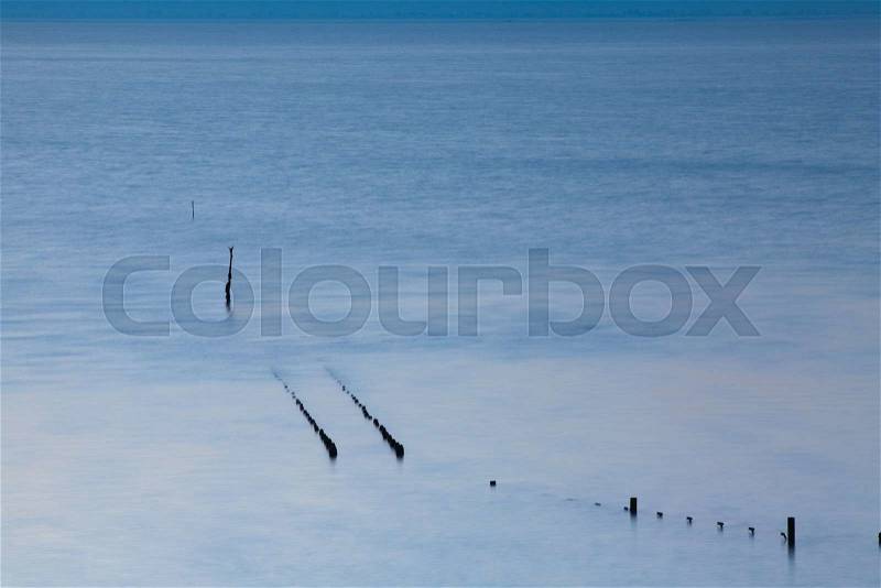 View of oyster farm after high tide in the Atlantic Ocean, Cancale, Brittany,France, stock photo