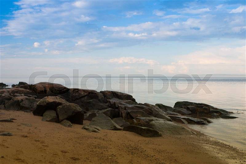 Empty beach on St.Lawrence river at sunrise, St.Simeon ,Canada, stock photo