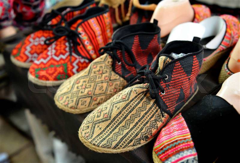 Native handmade shoe sale on mountain of thailand, stock photo