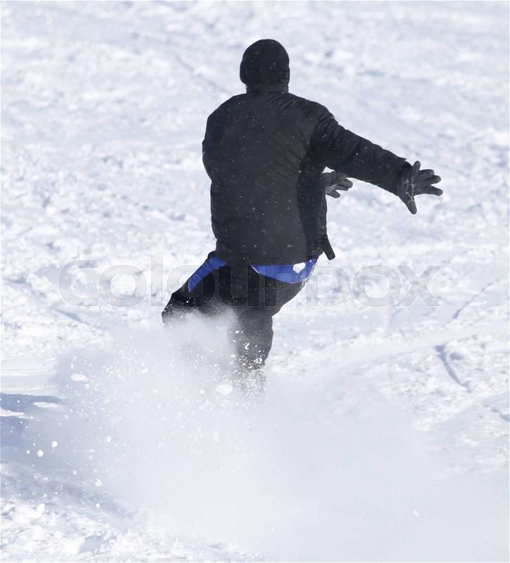 People snowboarding on the snow in the winter, stock photo