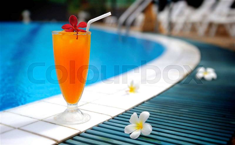 Swiming pool drink orange juice fresh for drink, stock photo