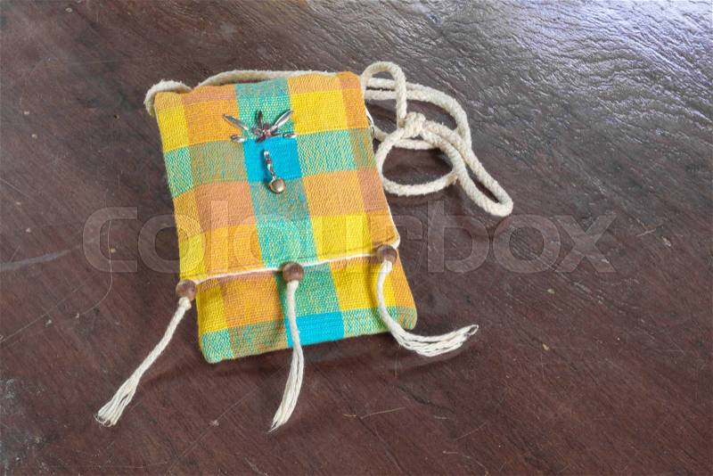 Colorful knitting bags on the wood table, stock photo