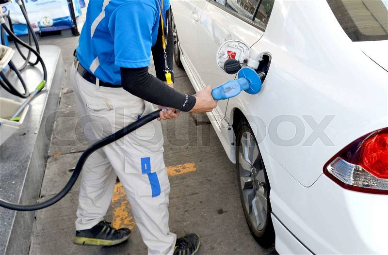 Gasoline pump fill time of power, stock photo