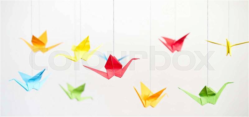 Origami birds on a ropes, stock photo