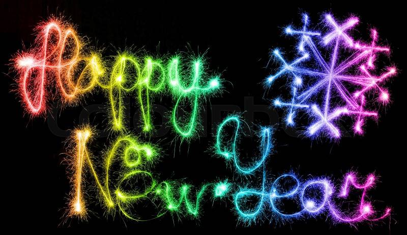 Happy New Year made of sparkles on black background, stock photo