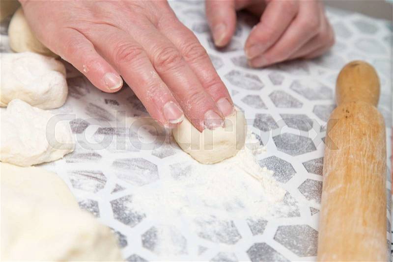 Cooking cakes of the dough in the kitchen, stock photo