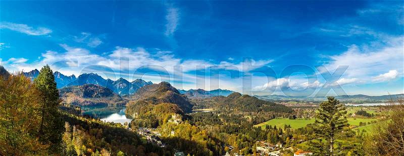 Alps and lakes in a summer day in Germany. Taken from the hill next to Neuschwanstein castle, stock photo