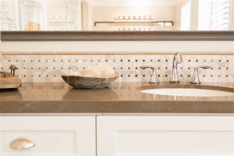 Beautiful New Modern Bathroom Sink, Faucet, Subway Tiles and Counter. , stock photo
