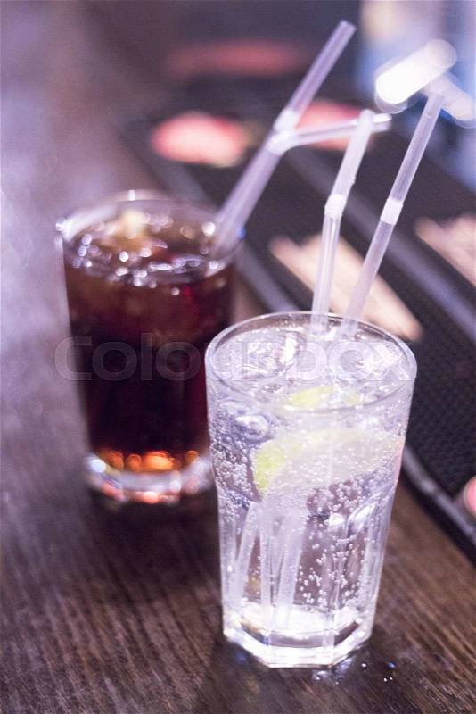 Glasses and drinking straw in bar in wedding reception party photo, stock photo