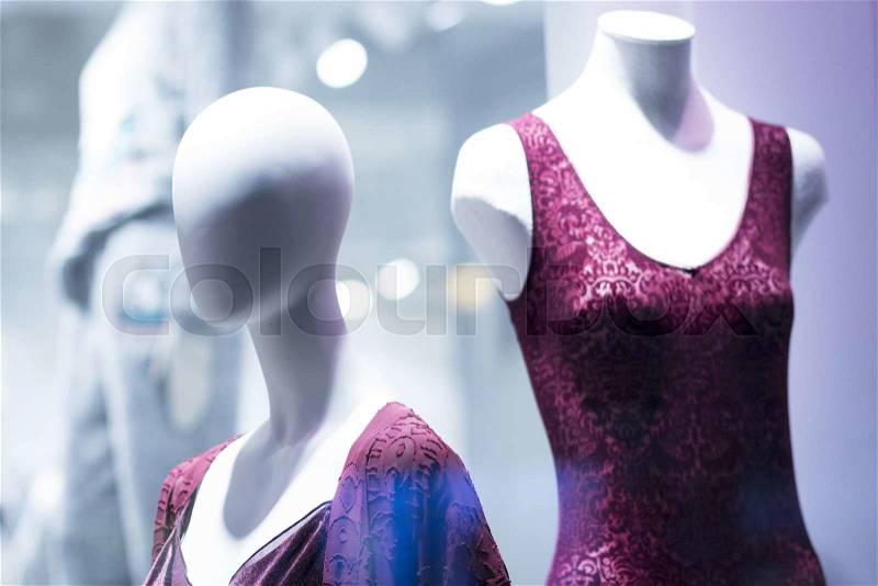 Shop dummy underwear fashion lingerie mannequin in department store boutique window wearing current fashions in clothes, stock photo