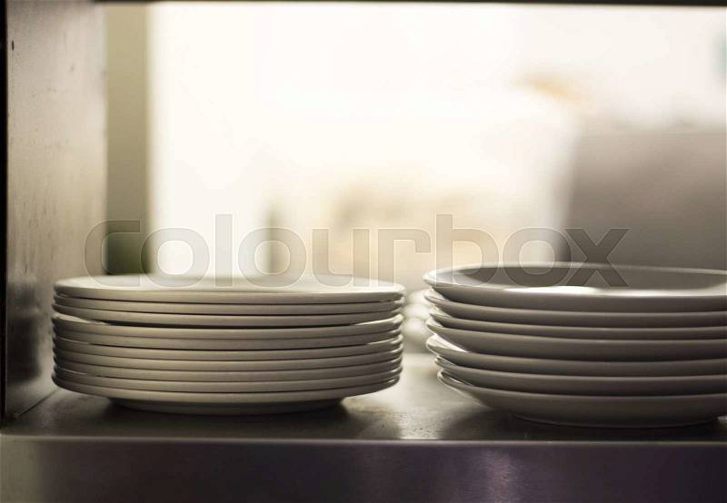 Plates in restaurant cafe kitchen photo, stock photo