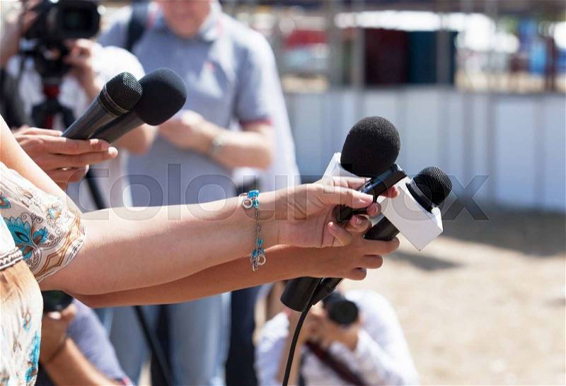 News conference. Media interview, stock photo