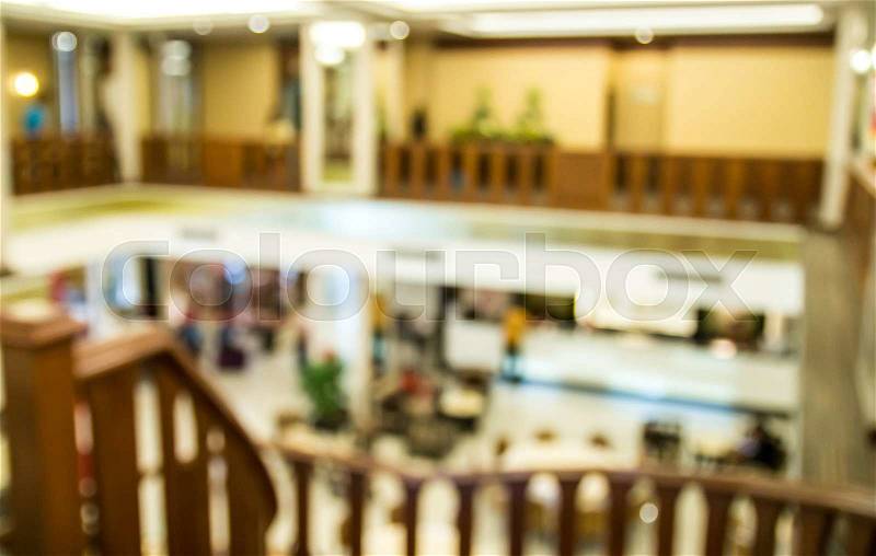 Blur image of hotel reception with bokeh on day time for background and any design, stock photo