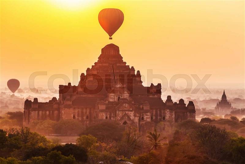 Sunrise over Dhammayangyi temples, Bagan, Myanmar, stock photo