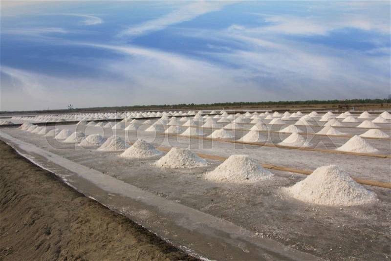 A lot of salt piles in salt farm, Samutsongkram, Thailand, stock photo
