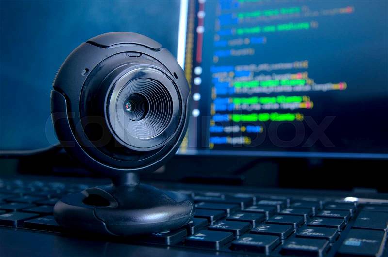Web surveillance camera. Spying and safety on the Internet, stock photo