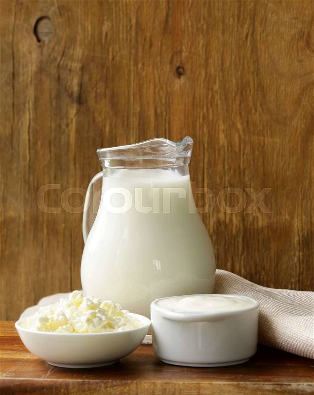 Still life of dairy products (milk, sour cream, cottage cheese), stock photo