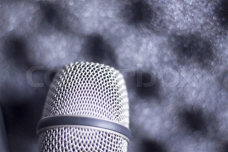Audio recording vocal studio professional microphone and hard metal and foam insert carry case to record singing or voice-overs, stock photo
