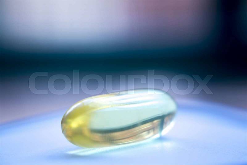 Cod liver fish oil omega 3 6 9 capsule health food suplement vitamin and mineral pill photo, stock photo